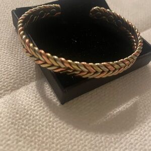 Elegant Gold and Copper Braided Bracelet
